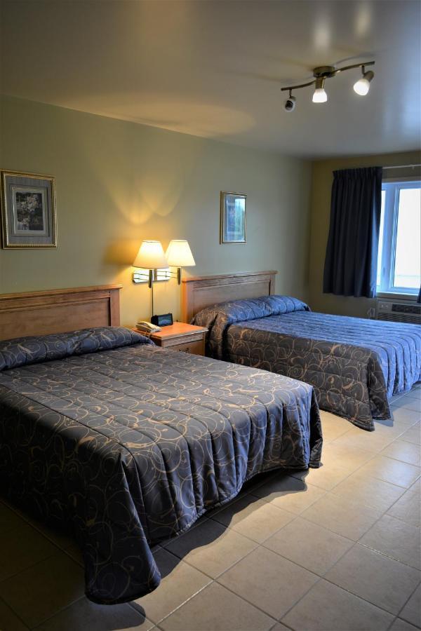 Motel Quatre Saisons Форествилл Экстерьер фото